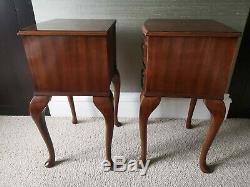 A pair of 1930's George III style mahogany bow front bedside tables
