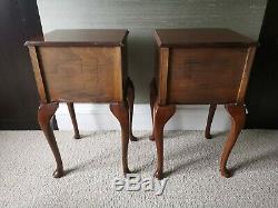 A pair of 1930's George III style mahogany bow front bedside tables