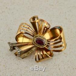 Antique French 18k gold sapphire/amethyst diamond bow brooch owned by Mirka Mora