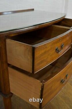 Antique mahogany bow front chest of drawers