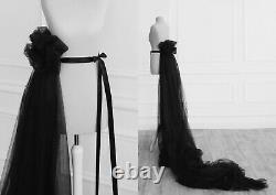 Extravagant detachable tulle train skirt. Avant-garde black bustle with train