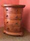 Miniature walnut bow front chest of drawers