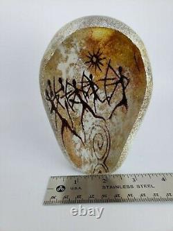 Richard Satava 1996 Petroglyph Cave, warriors with bows, signed glass paperweight