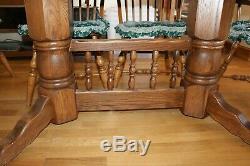 Solid Oak Amish Dining Table and 6 Bow Back Chairs expands 6 to 9 feet