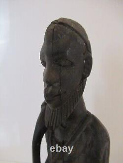 Vintage carved wood sculpture hand made bearded old African man carrying bow