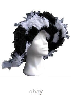 Woman hat fashion iconic runaway wide brim summer sun wedding black line vintage